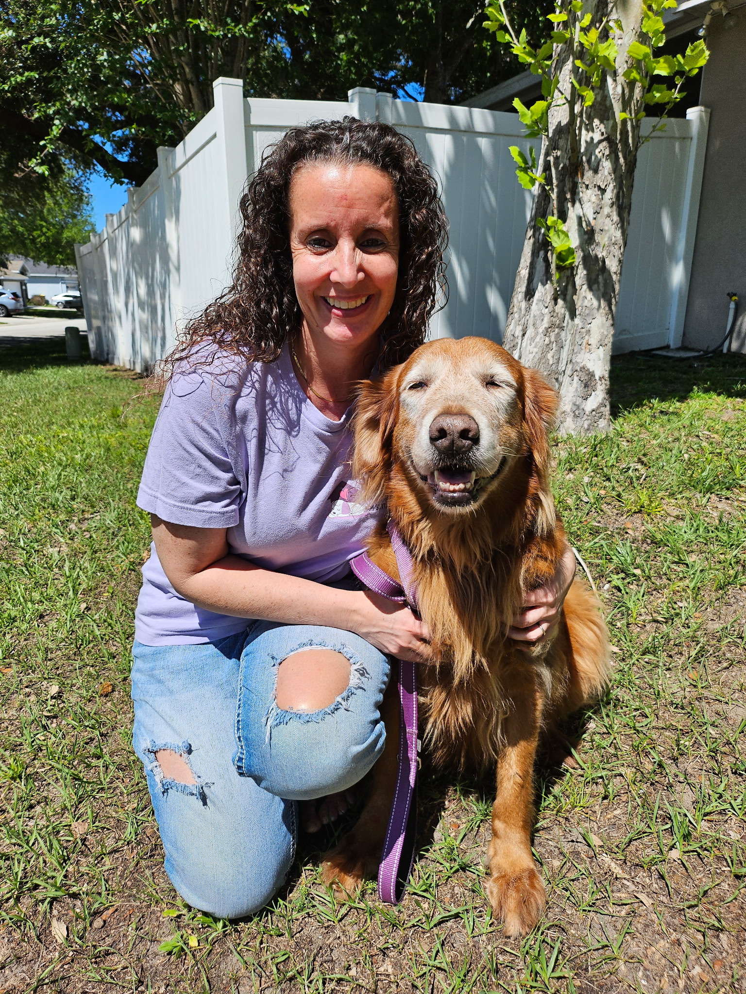 Amanda with adult golden retriever 