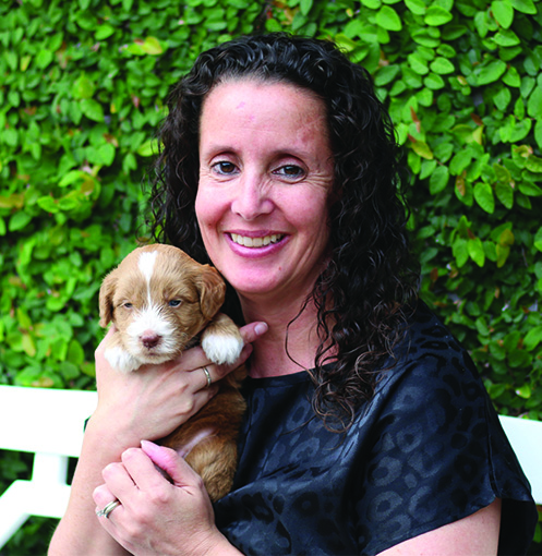 Owner and dog sitter Amanda of Feels Like Home Dog Sitting in Central FL.